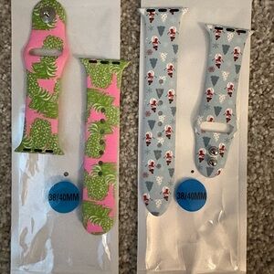 Lot of two watch bands, pink and green & snowman